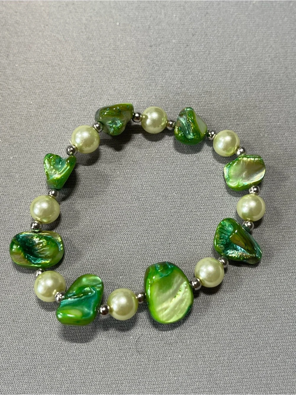 NWOT lovely green bead & pearl looking bead bracelet.  Comfortably fits 7” wrist